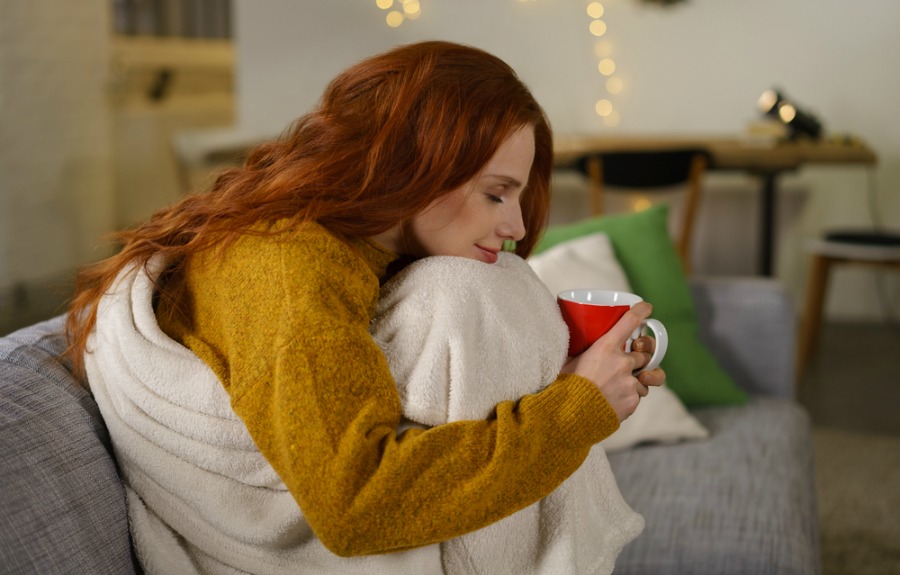 Redheaded Woman on the Cozy Couch Redheaded Woman on the Cozy Couch