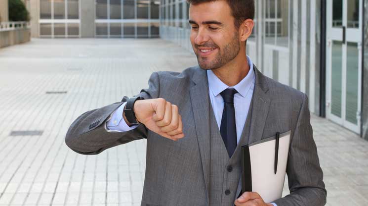 Man checking his fitbit