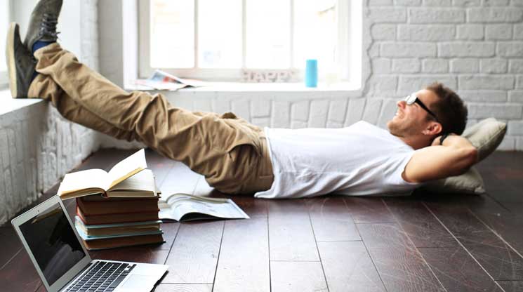 Man relaxing with his feet up